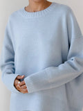 Luźny sweter z obniżoną linią ramion – Błękitny
